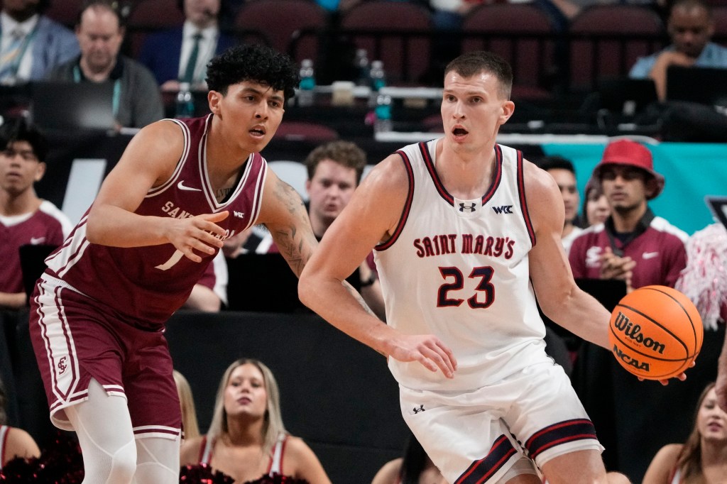 March 9, 2026; Las Vegas, NV, USA; Saint Mary's Gaels forward Paulius Murauskas (23) dribbles the basketball against Santa Clara Broncos guard Christian Hammond (1) during the first half at Orleans Arena. Mandatory Credit: Kyle Terada-Imagn Images