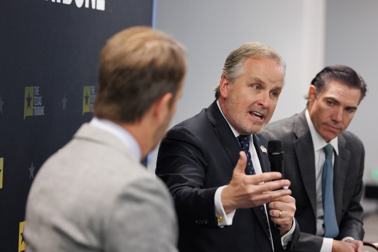 State Sen. Bryan Hughes, R-Mineola, answers questions as state Rep. Morgan Meyer, R-University Park, listens during The Texas Tribune’s Y’all Street event, held at the Dallas Regional Chamber in Dallas on March 24, 2026.