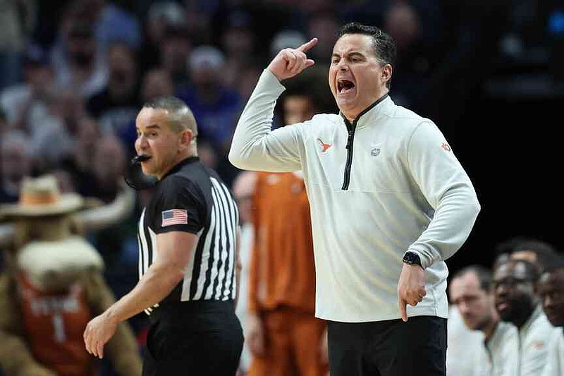 Texas head coach Sean Miller reacts during the second half in the first round of the NCAA college basketball tournament against BYU, Thursday, March 19, 2026, in Portland, Ore. (AP Photo/Amanda Loman)
