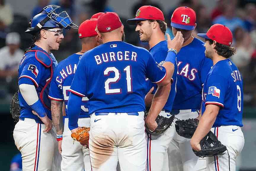 Texas rookie pitcher learns good news in mound visit