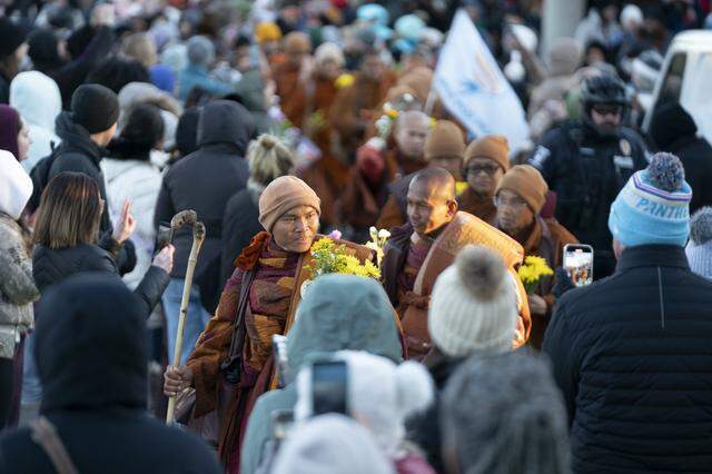 CHARLOTTE, NORTH CAROLINA - JANUARY 15: The venerable Bhikkhu Pannakara leads Buddhist monks as they continue the Walk for Peace on January 15, 2026 in Charlotte, North Carolina. The monks are walking from Houston, Texas to Washington, D.C. spreading a message of mindfulness, unity and kindness while requesting that Vesak, Buddha's birthday, be recognized as a U.S. federal holiday. (Photo by Sean Rayford/Getty Images)