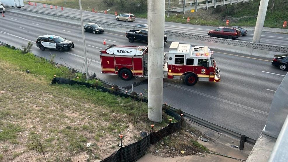Crews are working to remove an 18-wheeler that became stuck under a bridge along Interstate 35 in Central Austin Tuesday evening. (Photo: CBS Austin/Jalen Adams)