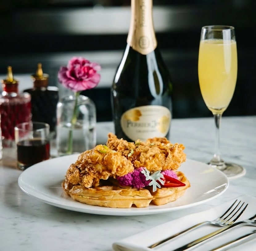 Chicken and waffles with sriracha honey and pecan-maple syrup will be served at Wicked Butcher.