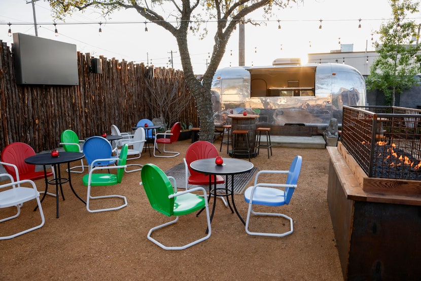 Outside of Kilmac's is a sunny garden with an Airstream bar.