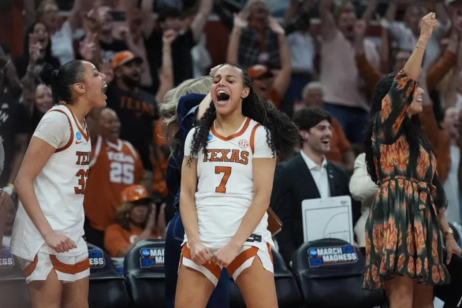 Texas forward Teya Sidberry (32) and guard Jordan Lee (7) celebrate their win over Oregon in the second round of the NCAA college basketball tournament, Sunday, March 22, 2026, in Austin, Texas. (AP Photo/Eric Gay)