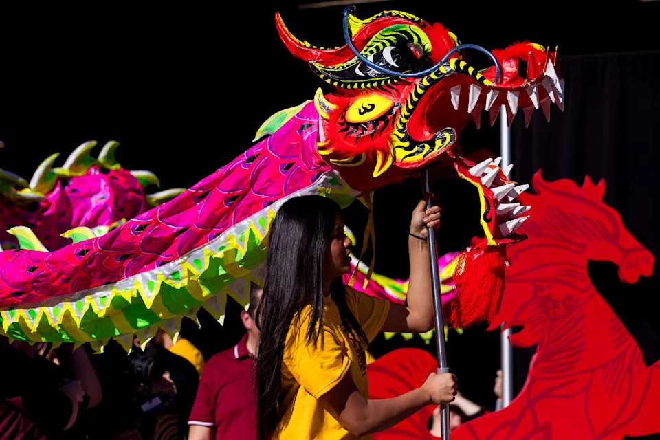 Members of the Ai-Hwa Chinese Language School perform a dragon dance at Cleveland Square Park during El Paso’s Lunar New Year celebration on Saturday, Feb. 28, 2026, in El Paso.