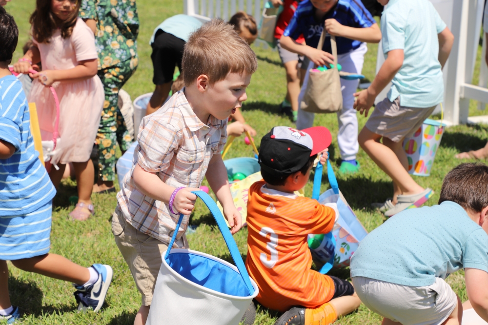 Children running around scrambling for eggs (pun intended)