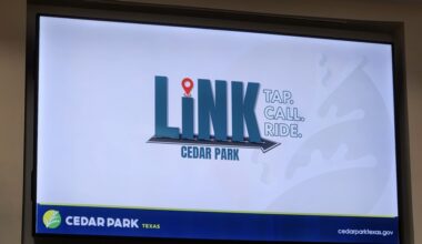 Director of Communications and Engagement Fran Irwin unveiled the logo for Cedar Park's on-demand rides program at a Feb. 26 City Council meeting. (Daniel Schwalm/Community Impact)