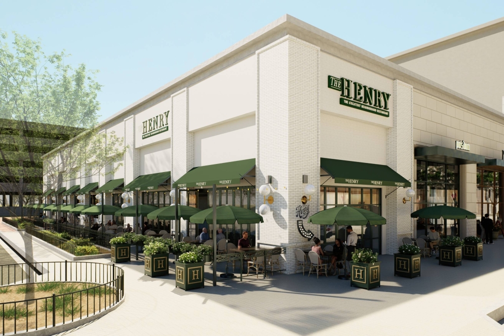 Architectural rendering of a corner spot in a strip center featuring The Henry signage and green awnings over multiple windows featuring outdoor seating areas.