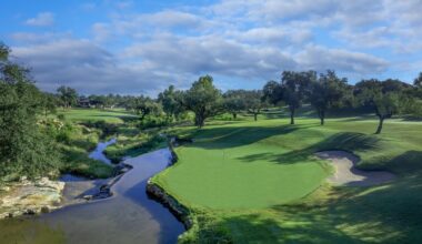 golfing green with lake