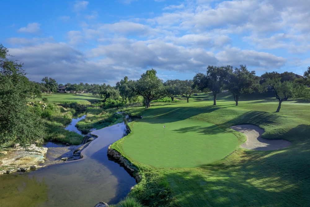 golfing green with lake
