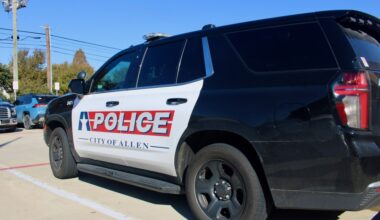 an Allen police car outside on a sunny day