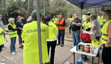 Fred Flickinger, who represents Houston City Council District E, speaks to volunteers during a Median Madness event in Kingwood. (Courtesy Houston City Council District E)