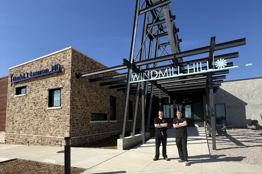 From left, Drs. Shawn Allen and Daniel J. Leeman celebrate the opening of the Georgetown clinic. (Courtesy Dr. Daniel J. Leeman)