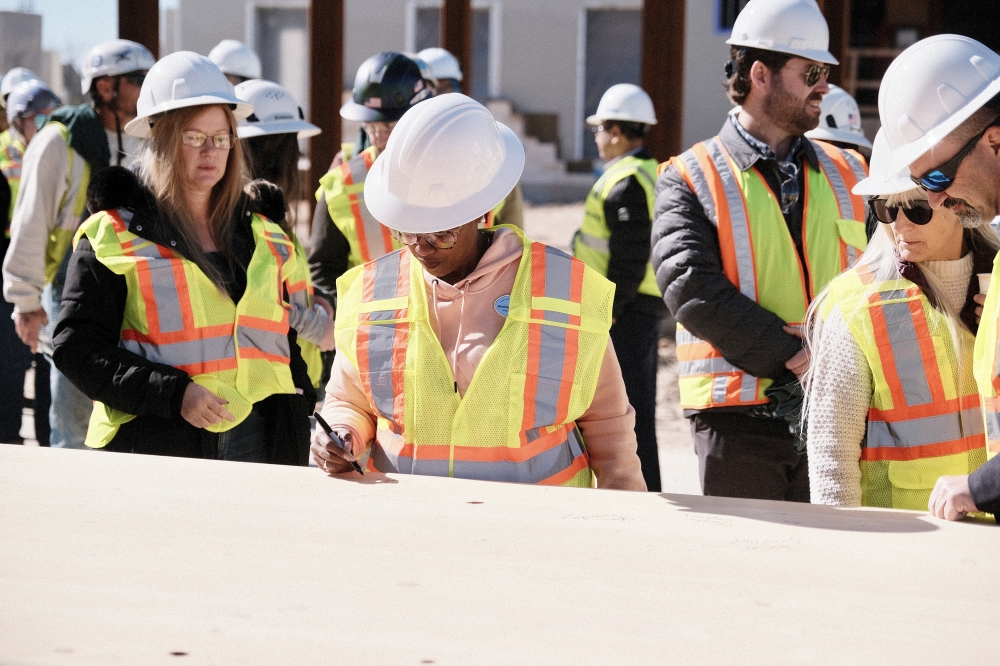 Construction crews placed the final beam at Pflugerville’s Monarch rec center, a voter-funded Downtown East development. (Manuel Holguin Jr./Community Impact)