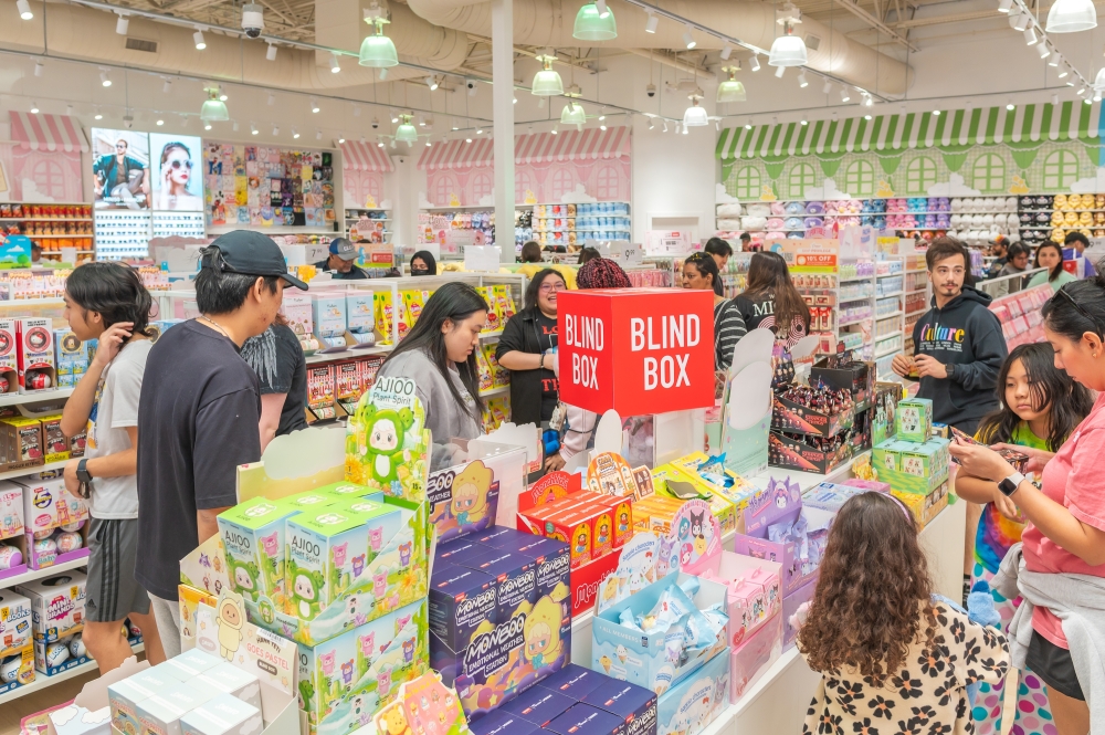 People shopping at a Miniso store