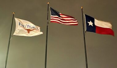 Flags outside Fort Worth City Hall