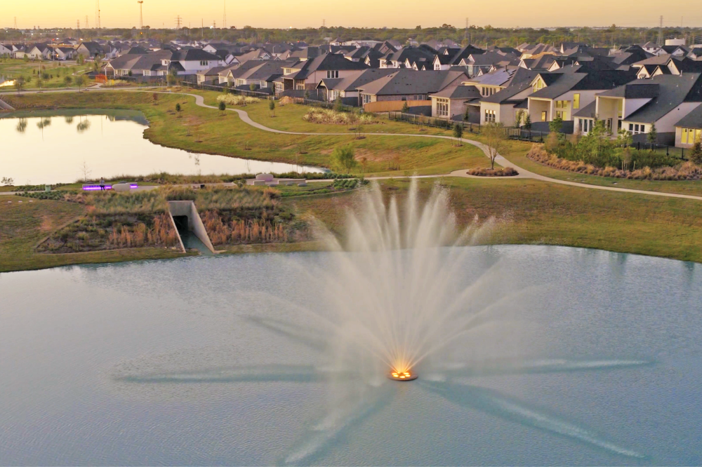 Aerial view of Jubilee wellness community in Hockley Texas developed by Johnson Development with parks, trails and wellness zones.
