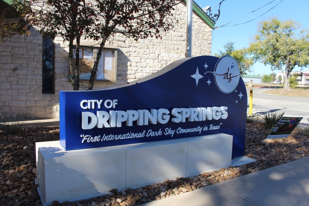 The gateway monuments are designed to look similar to the sign outside of City Hall. (Sienna Wight/Community Impact)