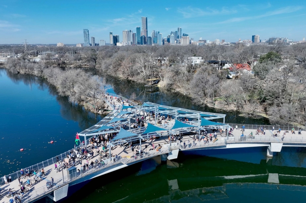 An aerial view of the Wishbone Bridge with pedestrians