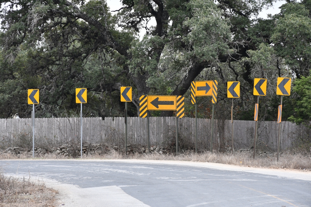 The current plan for the reconstruction of Ammann Road is to soften the southern curve near Rolling Acres Trail. (Jarrett Whitener/Community Impact)