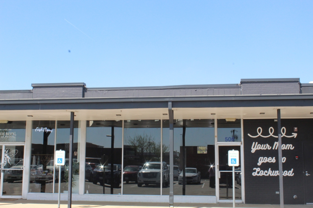 Kid N Play will be located between Lockwood Distilling Company and Lizzie Bee's Flower Shoppe. (Isabella Zeff/Community Impact)