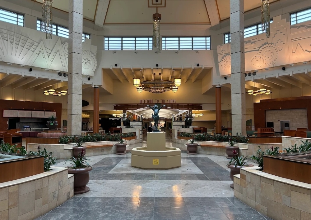 An empty lobby in Willow Bend mall with marble flooring
