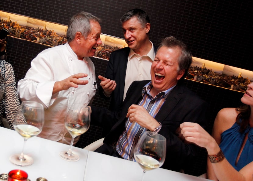 (Left to right) Chef Wolfgang Puck talks with Nils Stolzlechner, GM of Omni Dallas Hotel,...