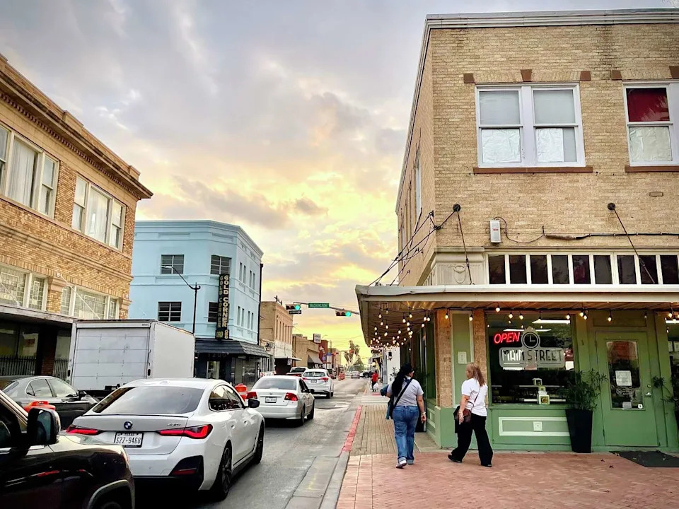 Traffic flows down East 12th Street toward the intersection of East 12th Street in downtown Brownsville on Friday, December 13, 2025. WalletHub ranked Brownsville, the Rio Grande Valley's largest city, as the unhealthiest city in America for 2026. (Dina Arévalo)