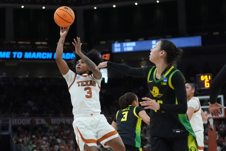 Texas guard Rori Harmon (3) shoots against Oregon during the second half in the second round of the NCAA college basketball tournament, Sunday, March 22, 2026, in Austin, Texas. (AP Photo/Eric Gay)