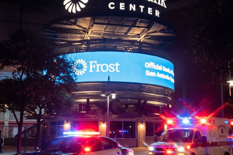 Police respond to the shooting outside the Frost Bank Center