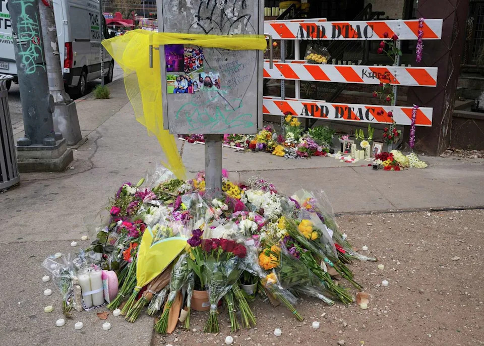 A growing memorial of flowers, candles and photographs honors the victims of the mass shooting outside Buford’s Backyard Beer Garden in Austin on Thursday, March 5, 2026. Ryder Harrington, 19; Savitha Shan, 21; and Jorge Pederson, 30, were killed in the shooting early Sunday. The gunman also died. (Jay Janner/Austin American-Statesman)