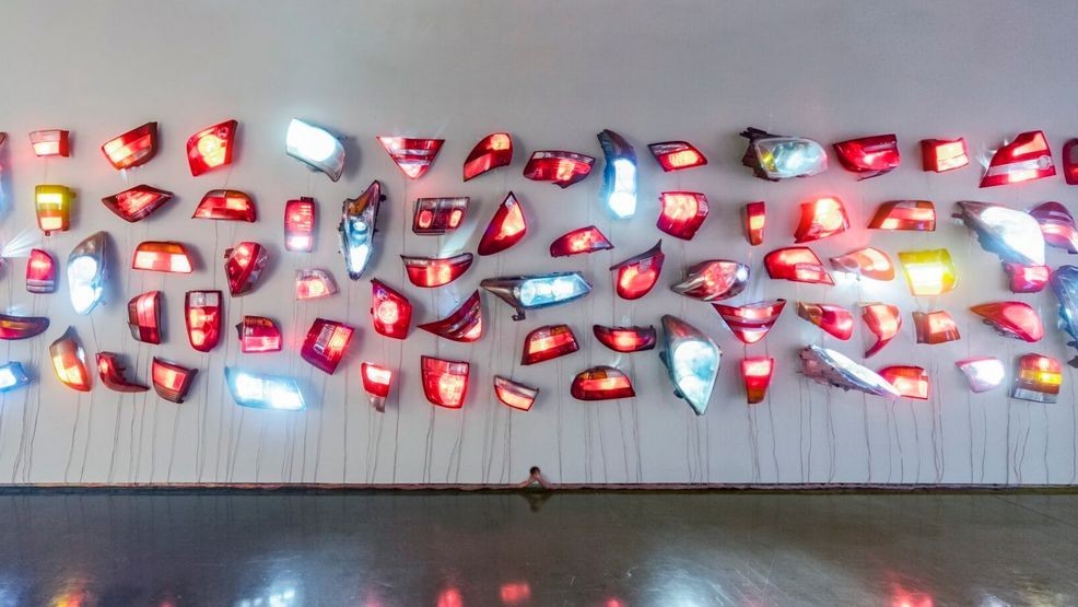 {p}Madeline Hollander, Heads/Tails: Walker & Broadway 4, 2020, 73 Automobile headlights and taillights customized with LEDs and real-time software program, infinite, display: 120 x 240 in., Collection of the Carl & Marilynn Thoma Foundation{/p}