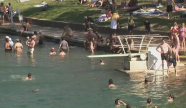 Barton Springs Pool reopens after construction delay, draws large crowds amid record heat