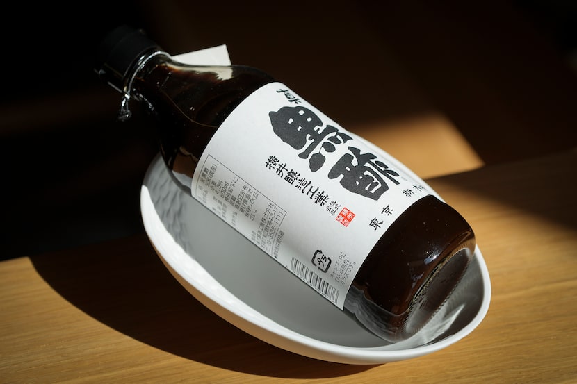 A bottle of Yokoi Black Vinegar is prominently displayed as you enter Ichika on Monday,...