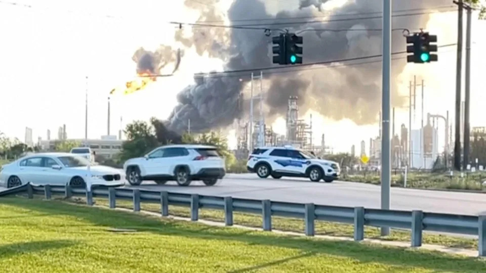 In this still image taken from a video provided by KBMT, smoke rises near the Valero Port Arthur Refinery in Port Arthur, Texas on March 23, 2026.  / Credit: KBMT via AP