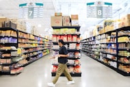 Manju Gummalla of McKinney shops the aisles at Hareli Fresh Market in Frisco, Texas, October...