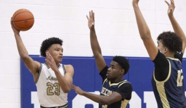 Arlington Grace Prep’s MJ Boyd (left) looks for an opening against Houston Second Baptist in the TAPPS Class 5A state championship game Saturday at Robinson High School.