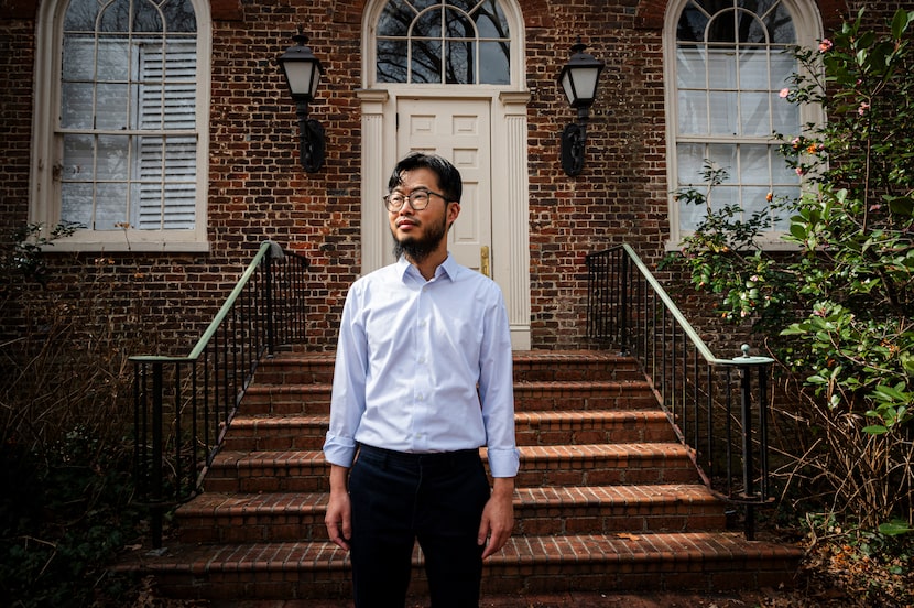 Charles Chear poses for a portrait in front of Person Hall at the University of North...