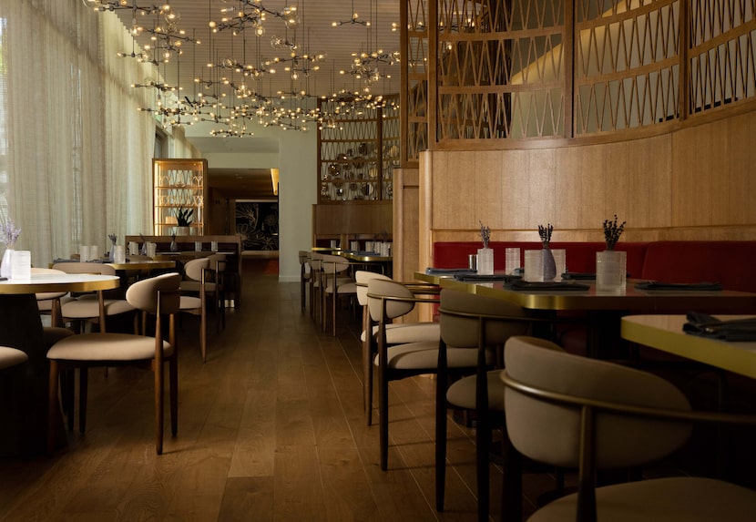 A dining area at Astra Kitchen + Lounge inside the Hall Arts Hotel on Friday, March 20,...