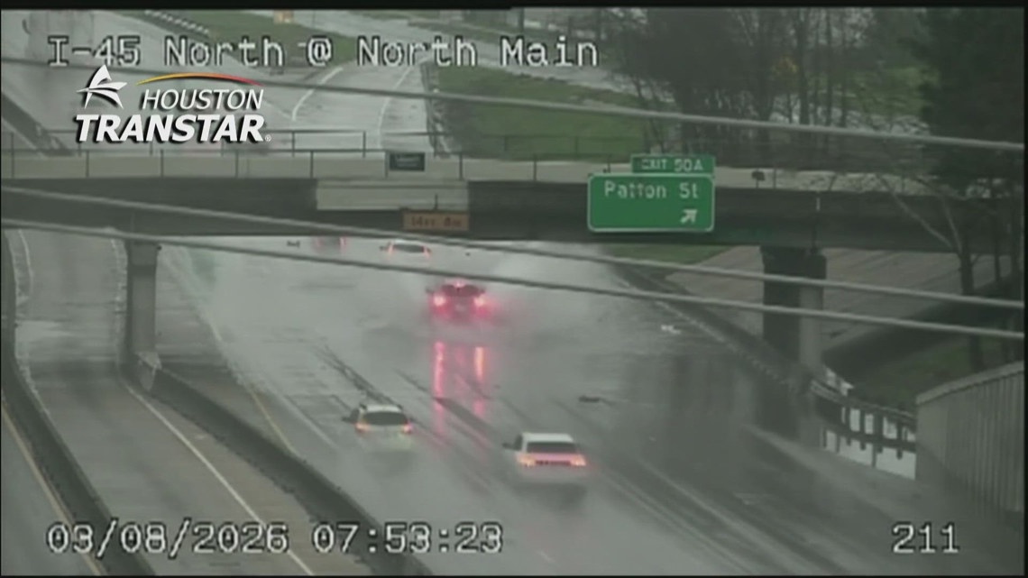 Drivers splash through high water on North Freeway and other trouble spots around town