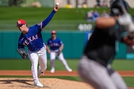 Texas Rangers pitcher Jacob Latz delivers during the second inning of a spring training game...