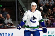Vancouver Canucks defenseman Tyler Myers (57) in the first period during an NHL hockey game...