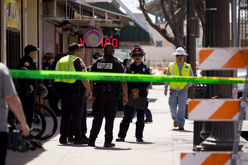 Police and emergency crews gather near the scene after part of a building collapsed in the 800 block of South El Paso Street in Downtown El Paso on Wednesday, March 18, 2026.