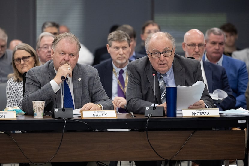 Regional Transportation Council chair Rick Bailey (center left) and Michael Morris (center...