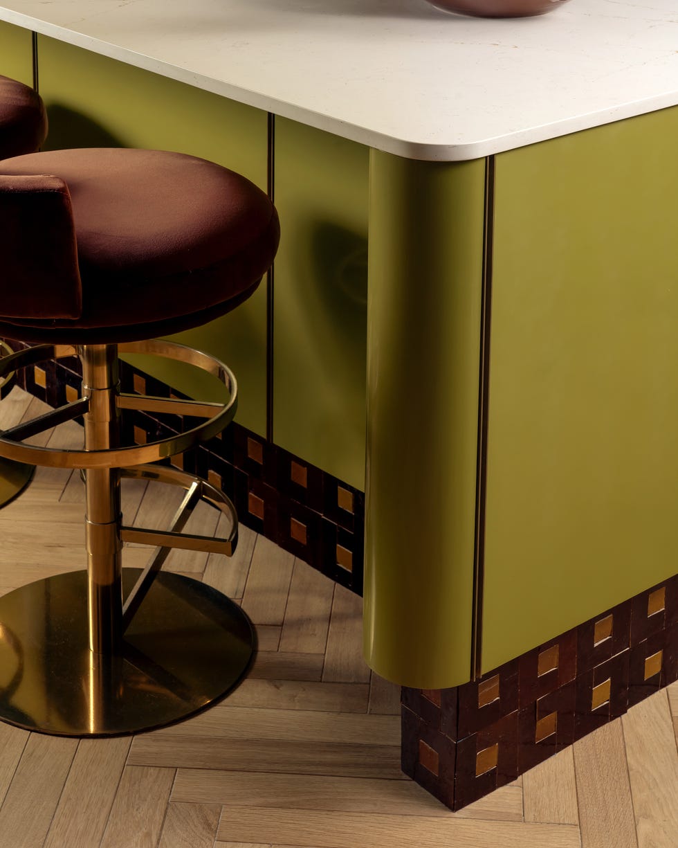 Modern kitchen countertop and seating area.
