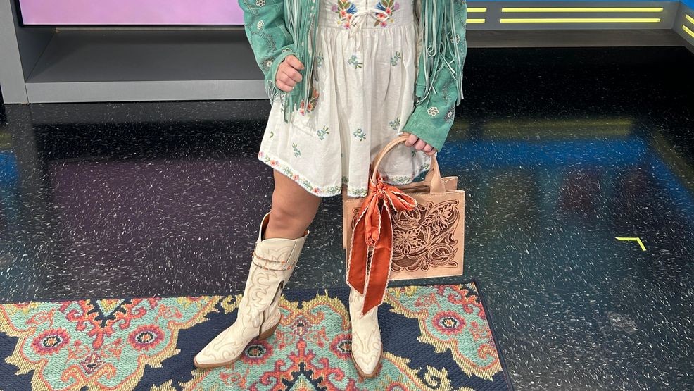 “Ashley is in a Show Me Your Mumu dress styled for the rodeo, but it could easily work for a bridal shower,” Carney added. “She’s wearing a lamb suede Skully jacket with turquoise beading, a Charlie 1 Horse and Strauss hat, Buck & Brana boots, a leather bag, and jewelry. For men, Hunter has on one of our brand new floral shirts with a vintage belt, Stetson straw hat, and decorated feathers—masculine but personalized. Nate is showcasing a breathable pearl snap shirt, bandana, felt hat with unique band and feather, plus Lucchese boots and vintage accessories.”