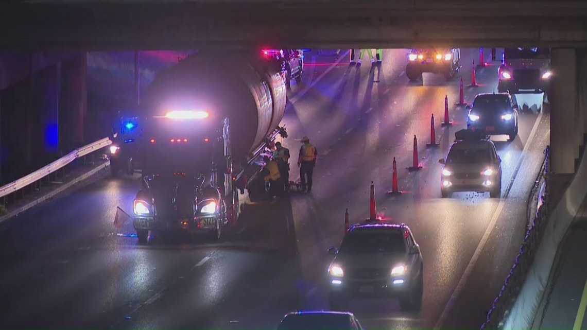 Semi-truck stuck under 11th Street Bridge in Downtown Austin