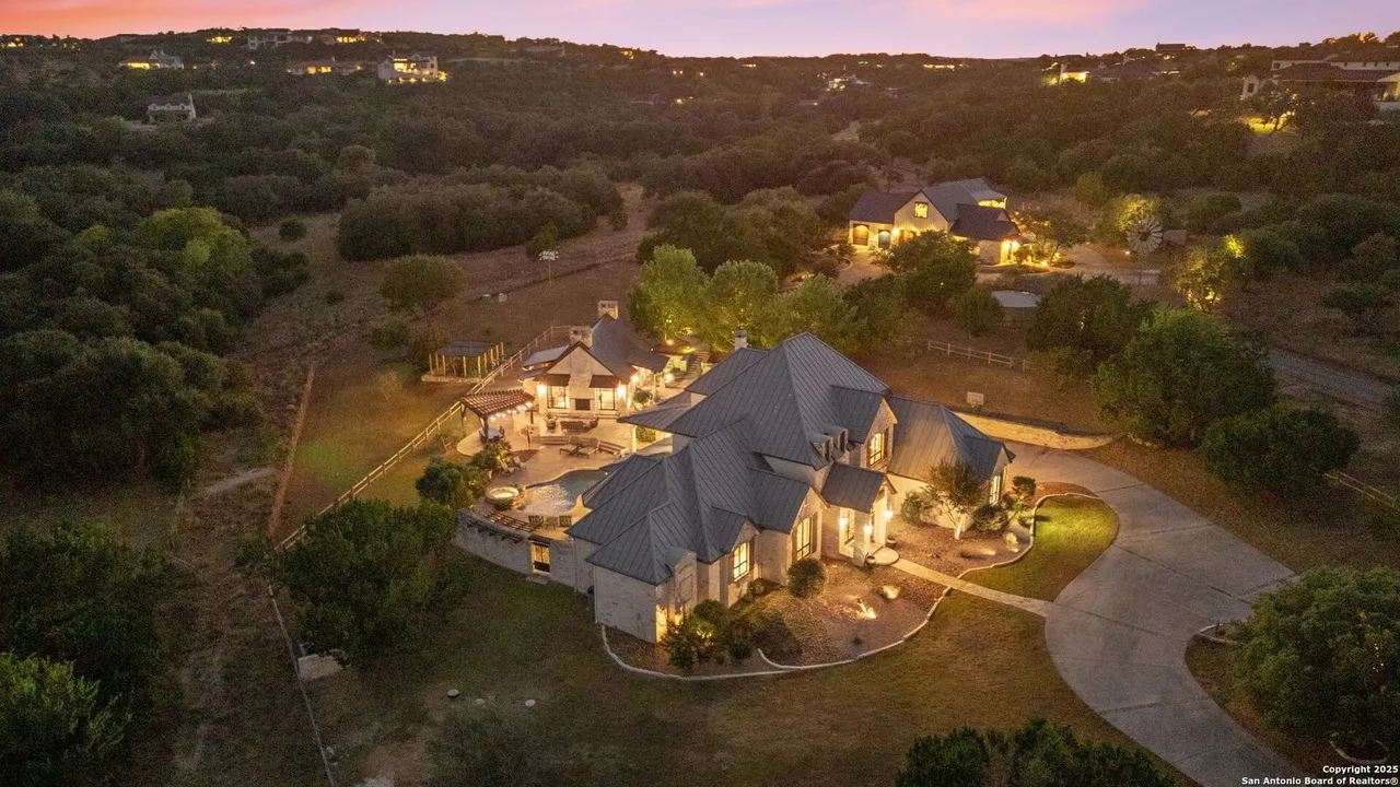 This Boerne mansion for sale comes with horse stalls and luxury air-conditioned dog kennels