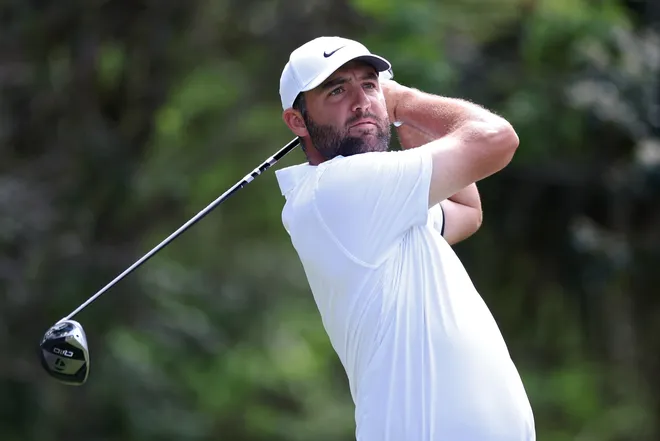 Scottie Scheffler of the United States plays his shot from the 15th tee during the third round of THE PLAYERS Championship 2026 at THE PLAYERS Stadium course at TPC Sawgrass on March 14, 2026 in Ponte Vedra Beach, Florida.